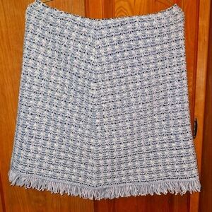 A St. John wool blend mini skirt in a size 10. Grey and lavender color scheme